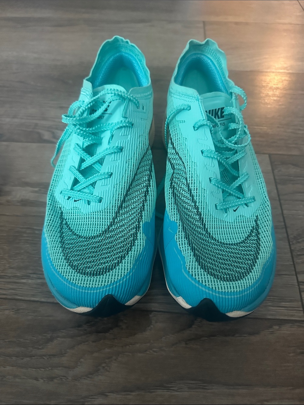 Nike vaporfly teal athletic running shoes